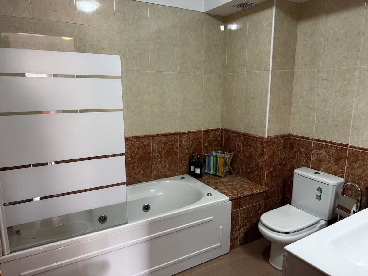 Bathroom with jacuzzi bathtub
