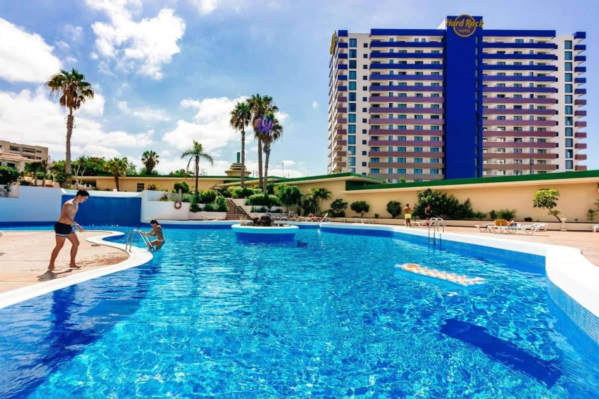 Communal pool with palm trees