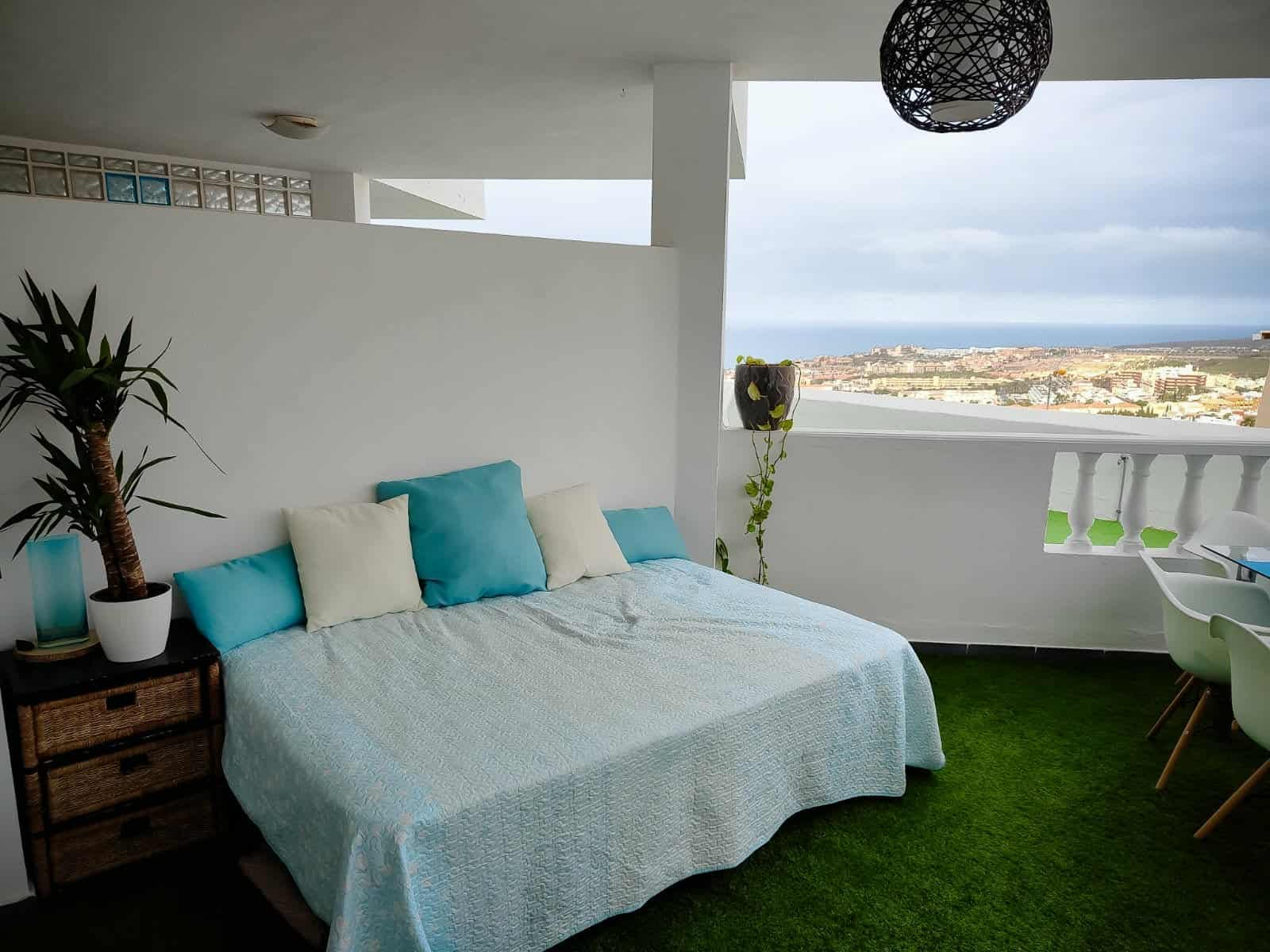 Main bedroom with balcony access
