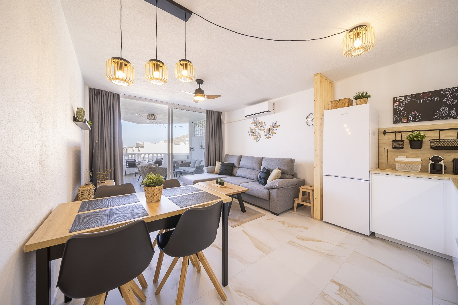 Living room with dining table and terrace door