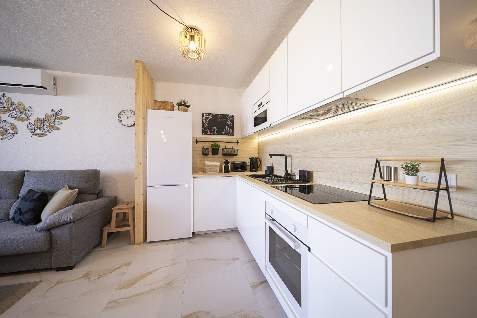 Open kitchen with oven and induction hob